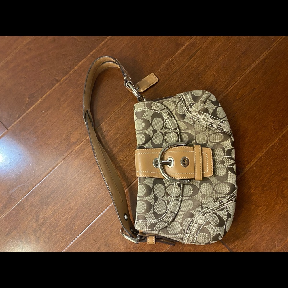 Coach purse with buckle. Perfect condition